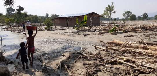 Villages make their way through the flooding and destruction caused by Hurricane Iota