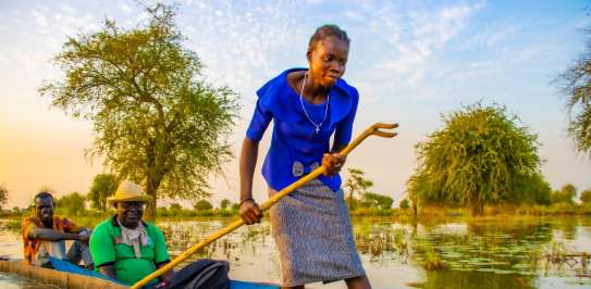 A woman in South Sudan canoeing