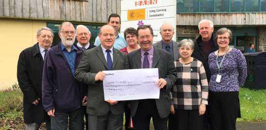 Christian Aid Wales team with Baptists of Wales holding their fundraising cheque