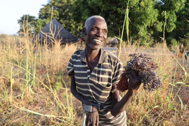 Luka Achor Awac, 49, on his farm in Western Bahr El Ghazel State, he grows tobacco, ground nut and sorghum