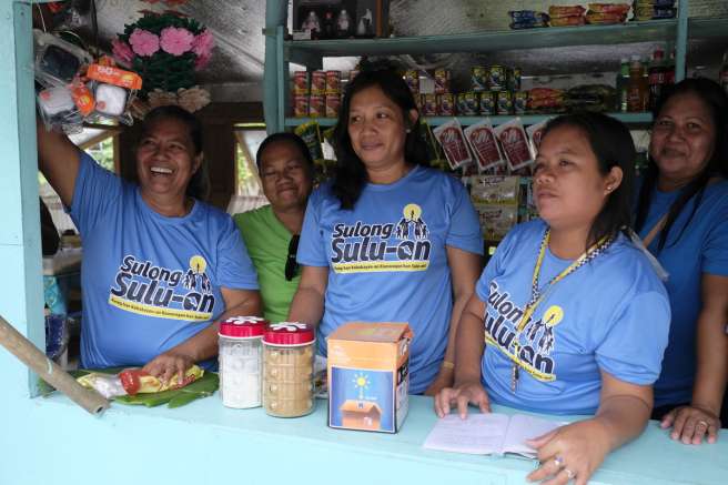 The 'Sulong Sulu-an' women's group, including fisherwoman Virginia (left), and women's group president Alma (second to right).