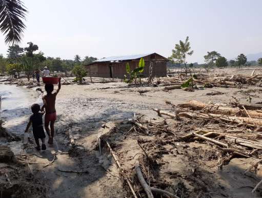 Villages make their way through the flooding and destruction caused by Hurricane Iota