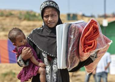 A woman and her child in Cox's Bazar refugee camp