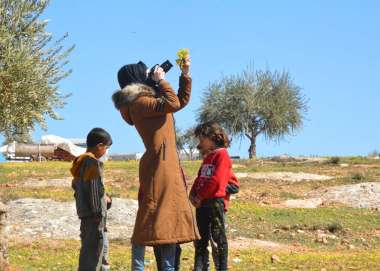 Haya learns to use a camera as part of the ‘My Syria’ 