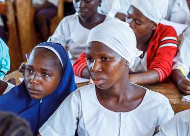 A group girls sat in a lesson