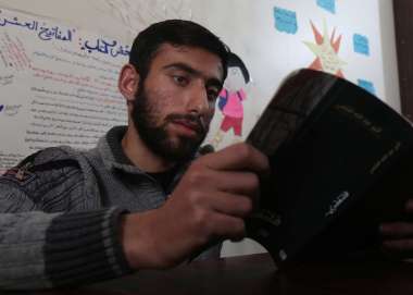 Mahmoud studying at his local education centre