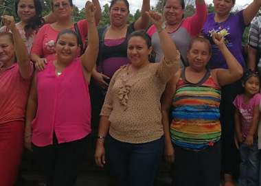 Women community leaders standing together in El Salvador