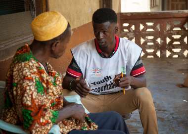 A youth accountability volunteer collects data during our SABI program, which aims to increase awareness of, and demand for, the delivery of basic services.