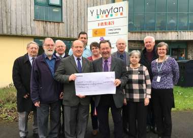 Christian Aid Wales team with Baptists of Wales holding their fundraising cheque